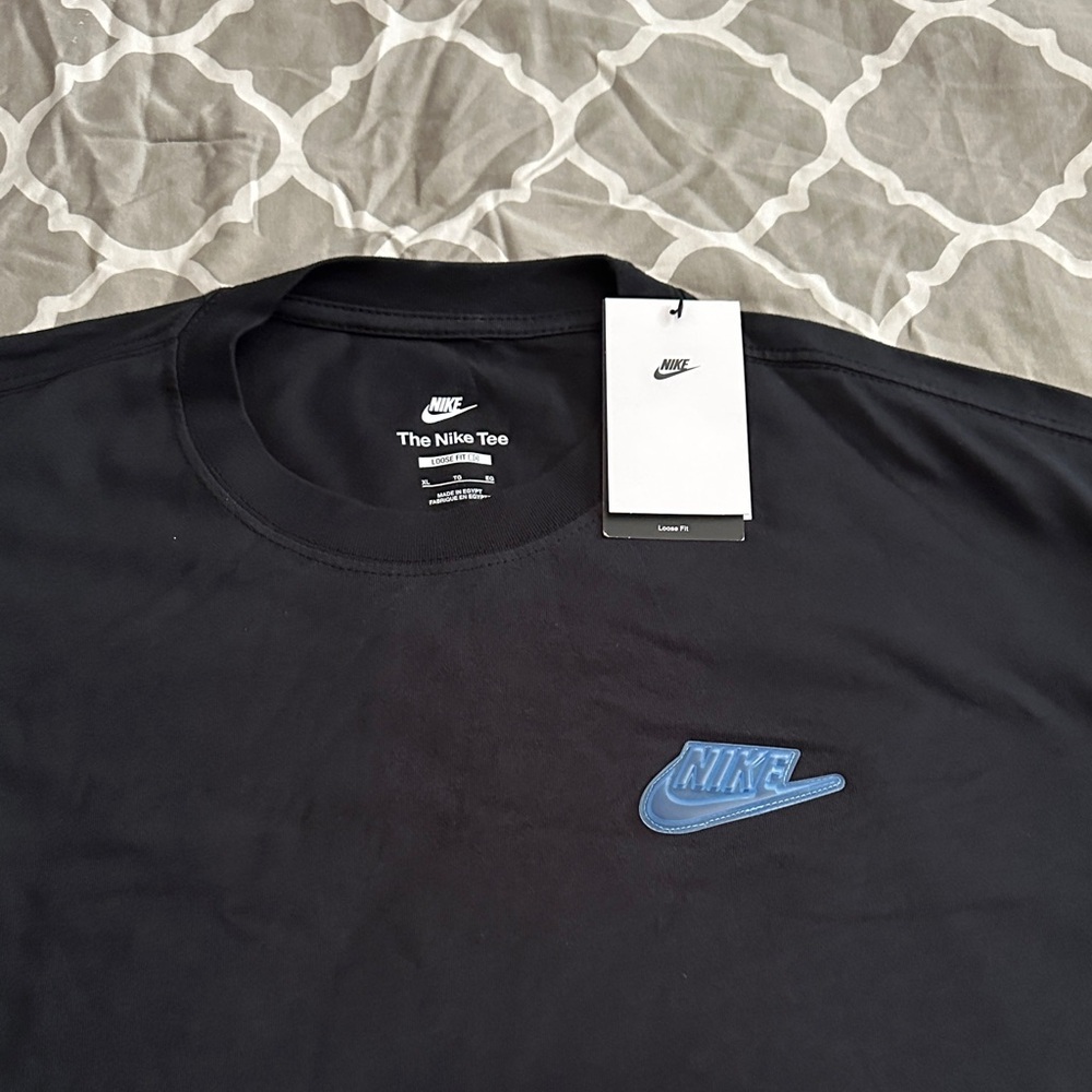 Nike Men's Black Tee with Blue Logo